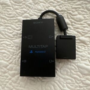 Sony PlayStation 2 Multitap adapter. SCPH-10090